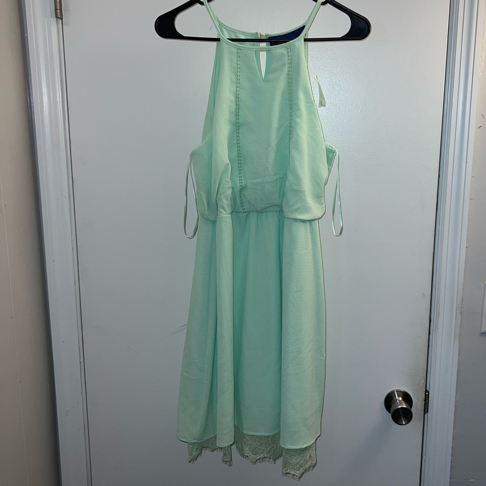 Mint green dress from Francesca’s. It’s a size medium & still has the tags on it